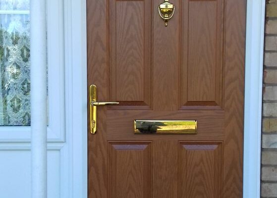 apex-windows-composite-front-door-wood-grain-effect-sunburst-arch