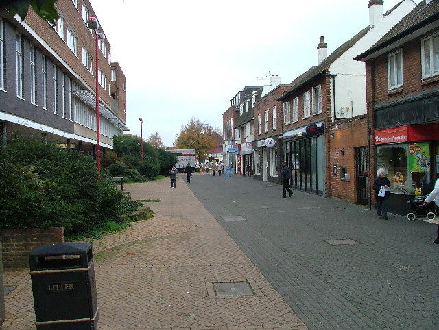 Hatfield town centre pedestrian precinct in Hertfordshire, showing brick-paved streets and local shops on a quiet weekday afternoon.